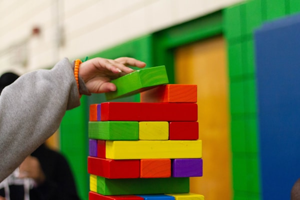 Kids building blocks in classroom
